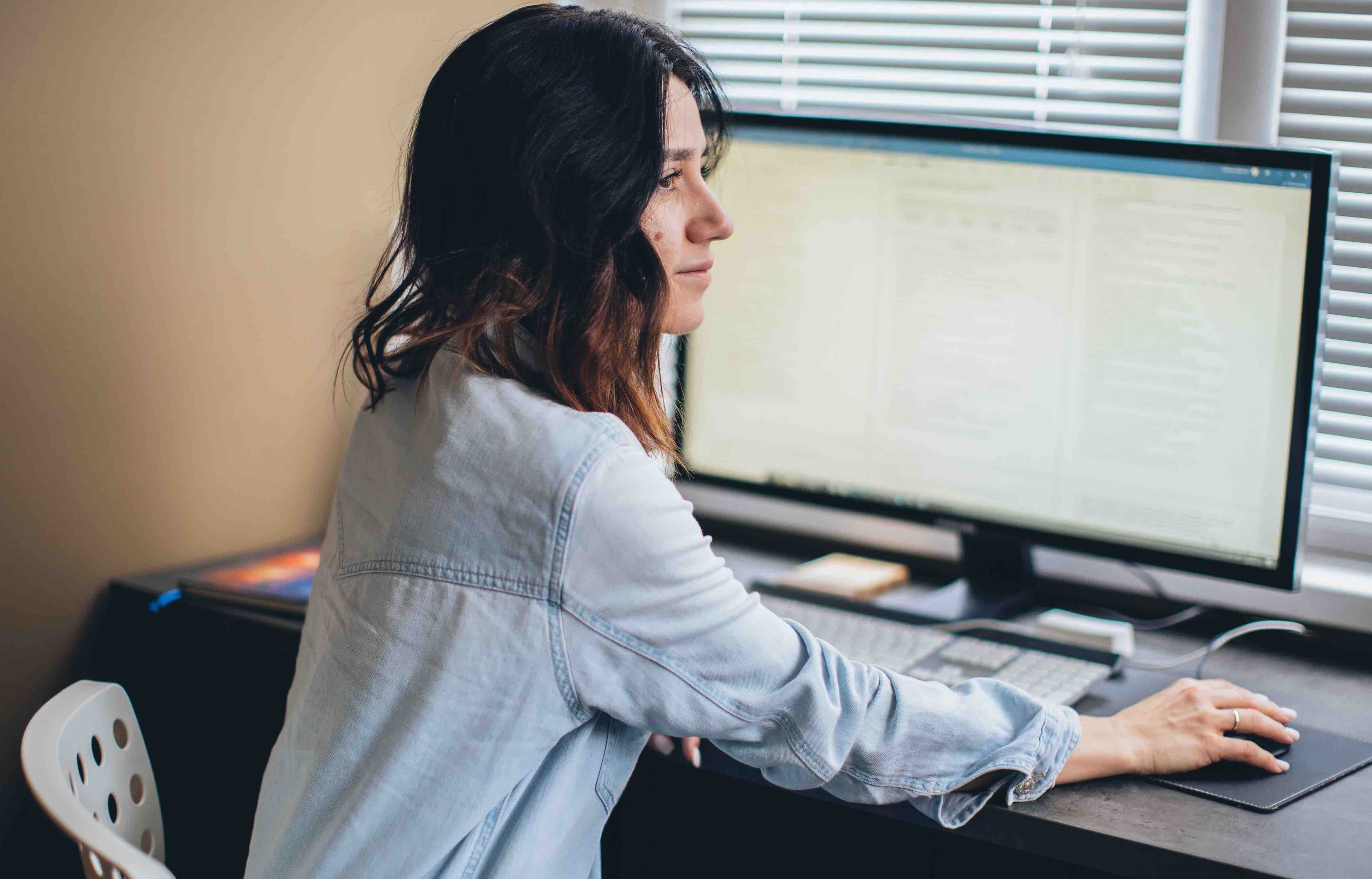 A student studying for the NPPE at a computer